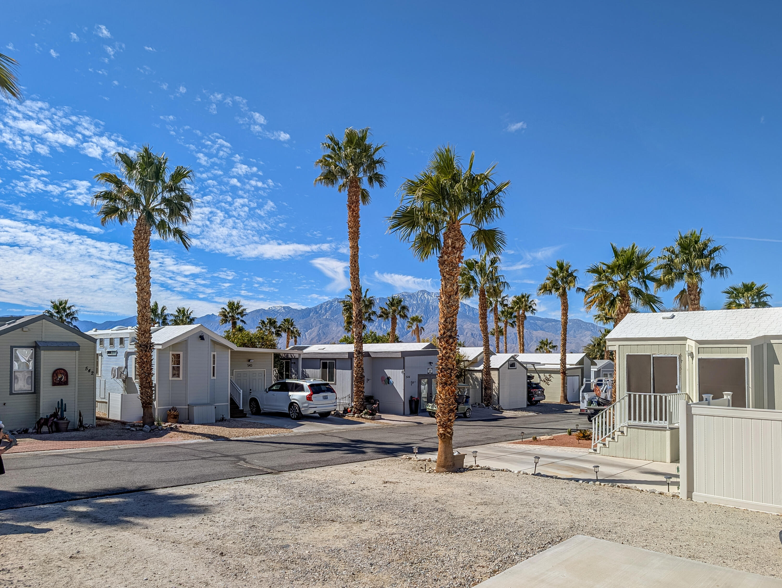 70200 Dillon Road, Unit 422 Desert Hot Springs, CA 92241 - Photo 7 of 25 a view of a street with palm trees