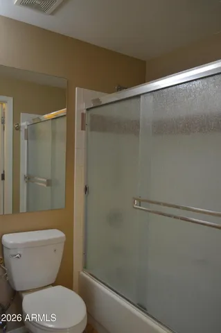 a picture of a park with a bench