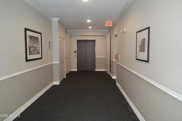 a view of a hallway with the view of a house
