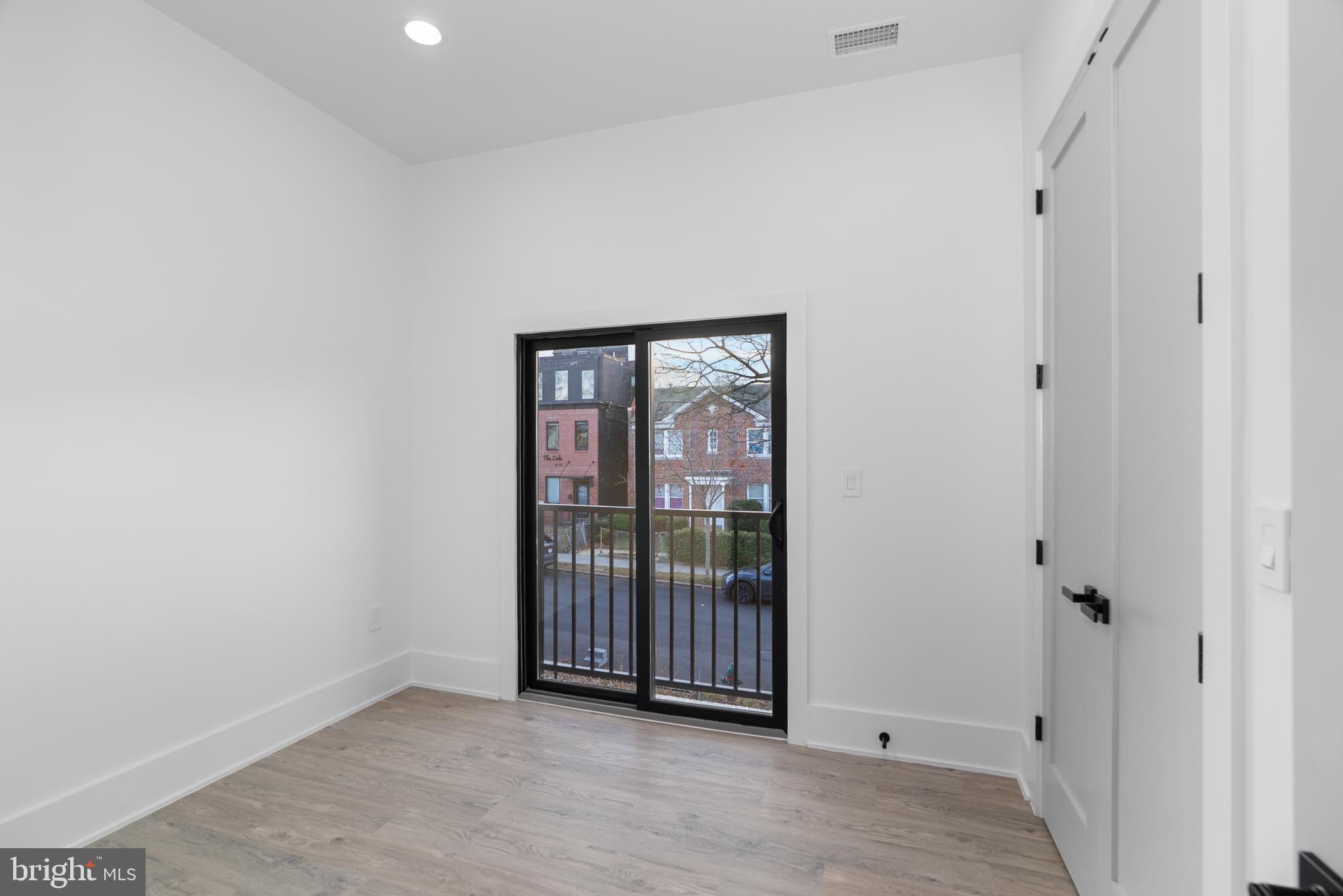1140 Oates Street Northeast, Unit 202 Washington, DC 20002 - Photo 26 of 48 wooden floor in a room