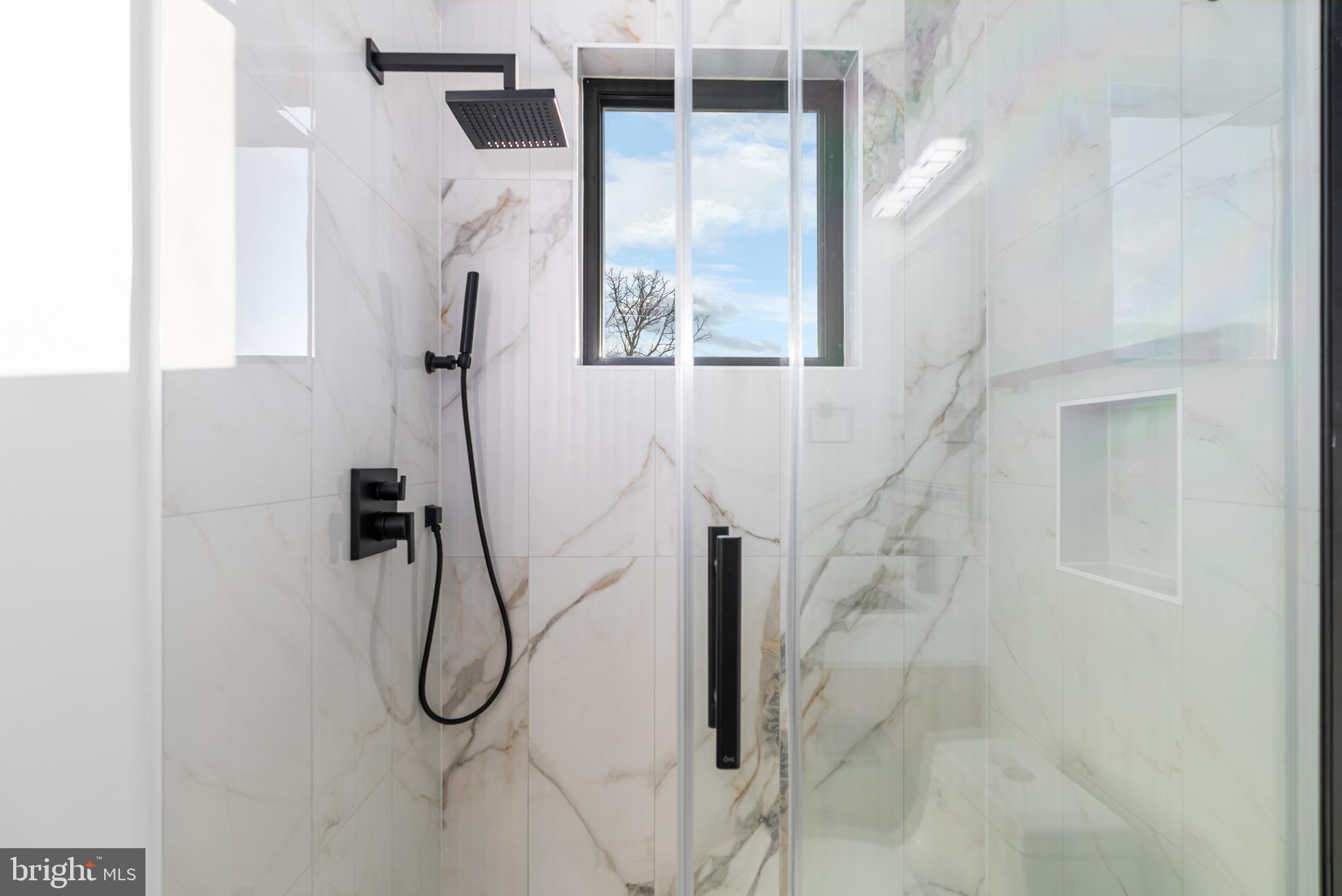 1140 Oates Street Northeast, Unit 202 Washington, DC 20002 - Photo 37 of 48 a bathroom with a shower