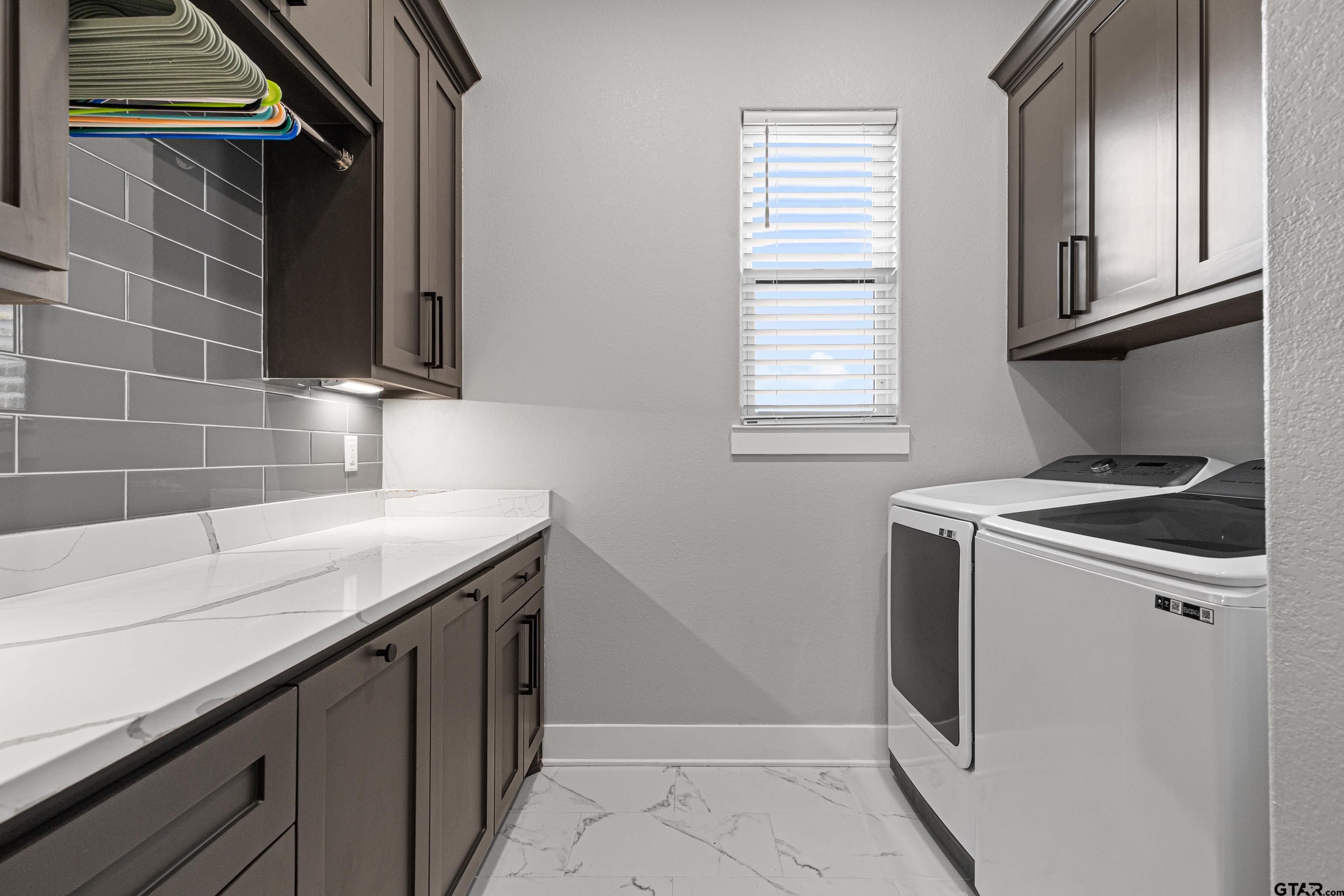 8947 Pomagranate Road Gilmer, TX 75645 - Photo 20 of 38 a view of a kitchen with a sink and dishwasher