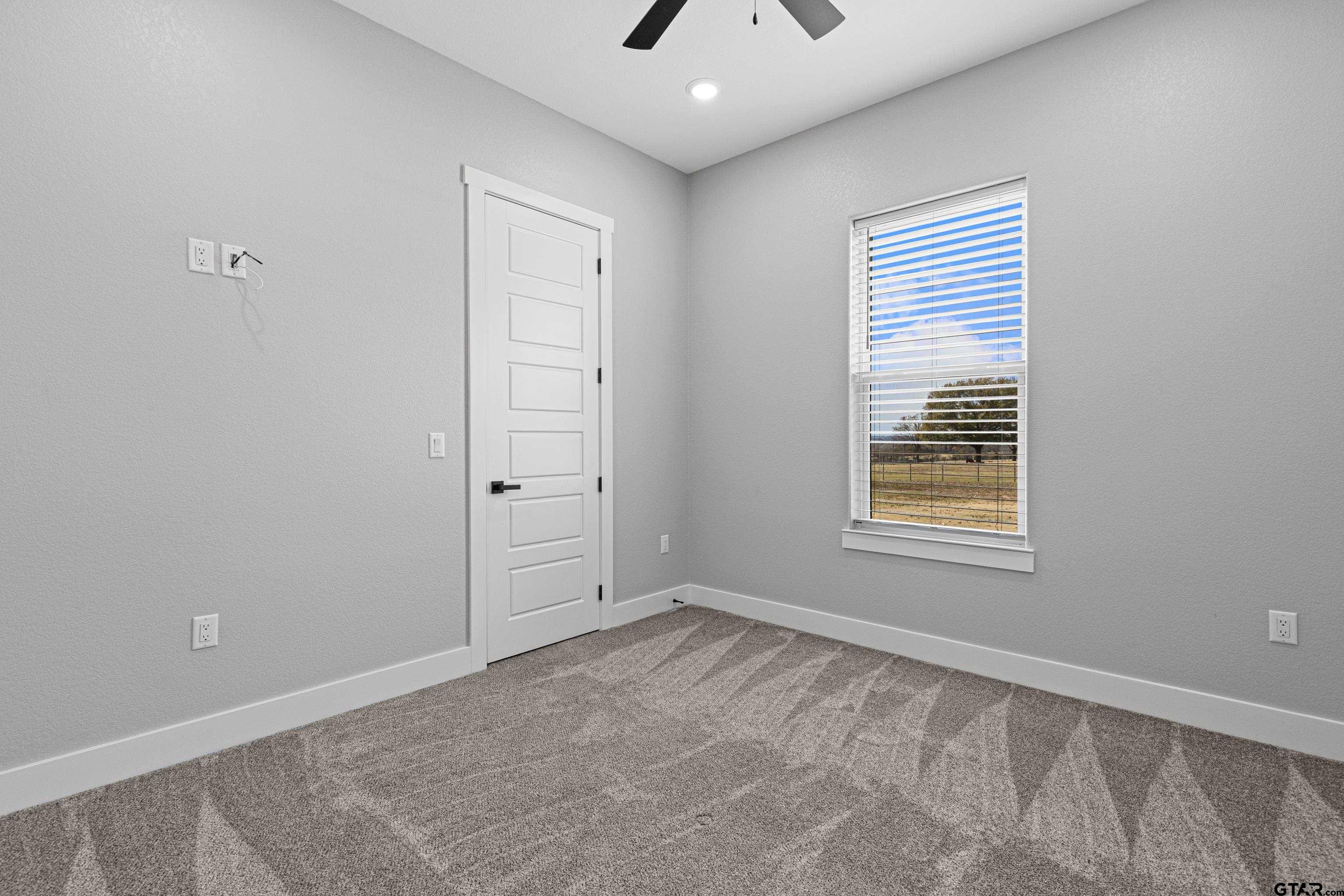8947 Pomagranate Road Gilmer, TX 75645 - Photo 33 of 38 a view of an empty room with a window