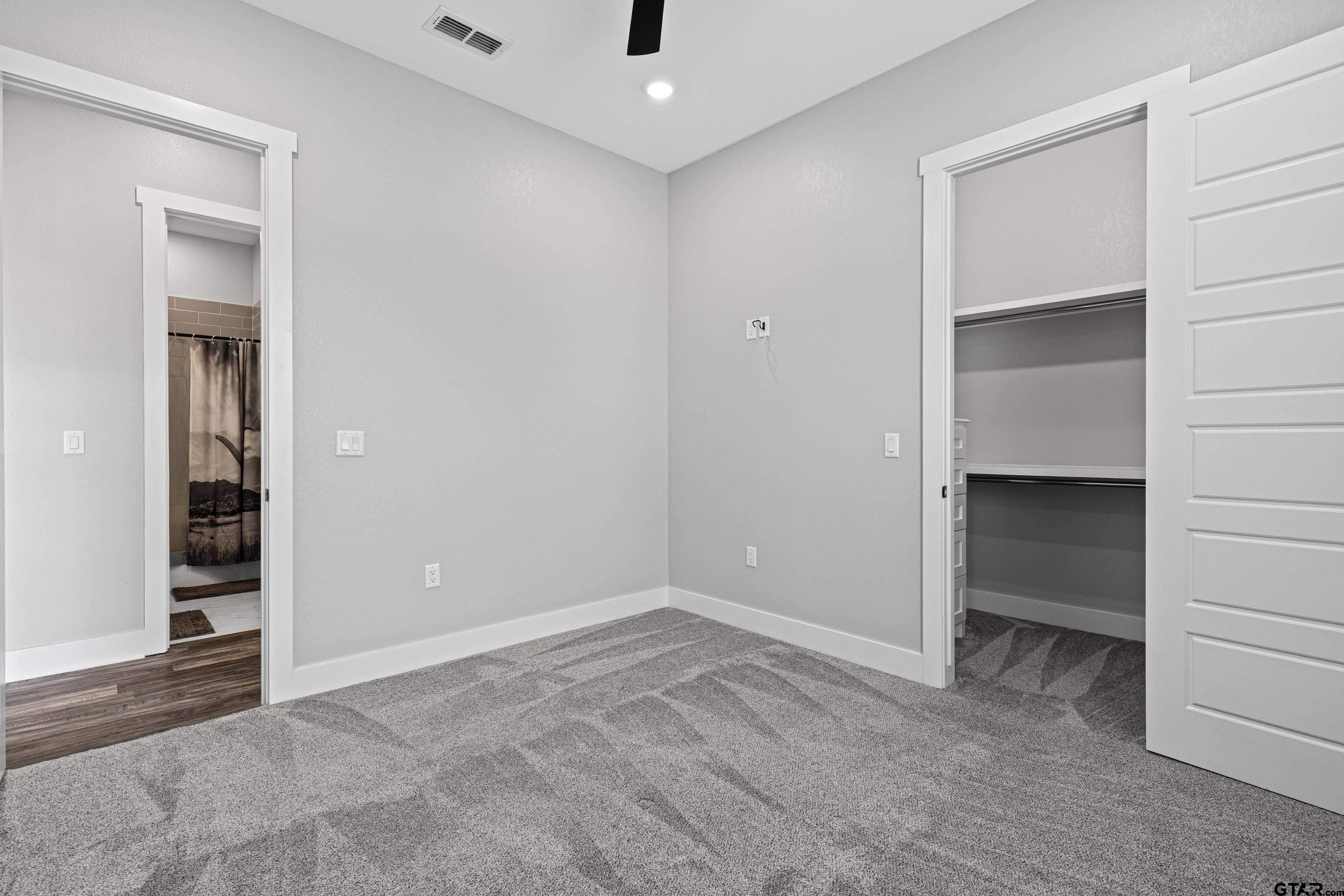 8947 Pomagranate Road Gilmer, TX 75645 - Photo 34 of 38 an empty room with closet