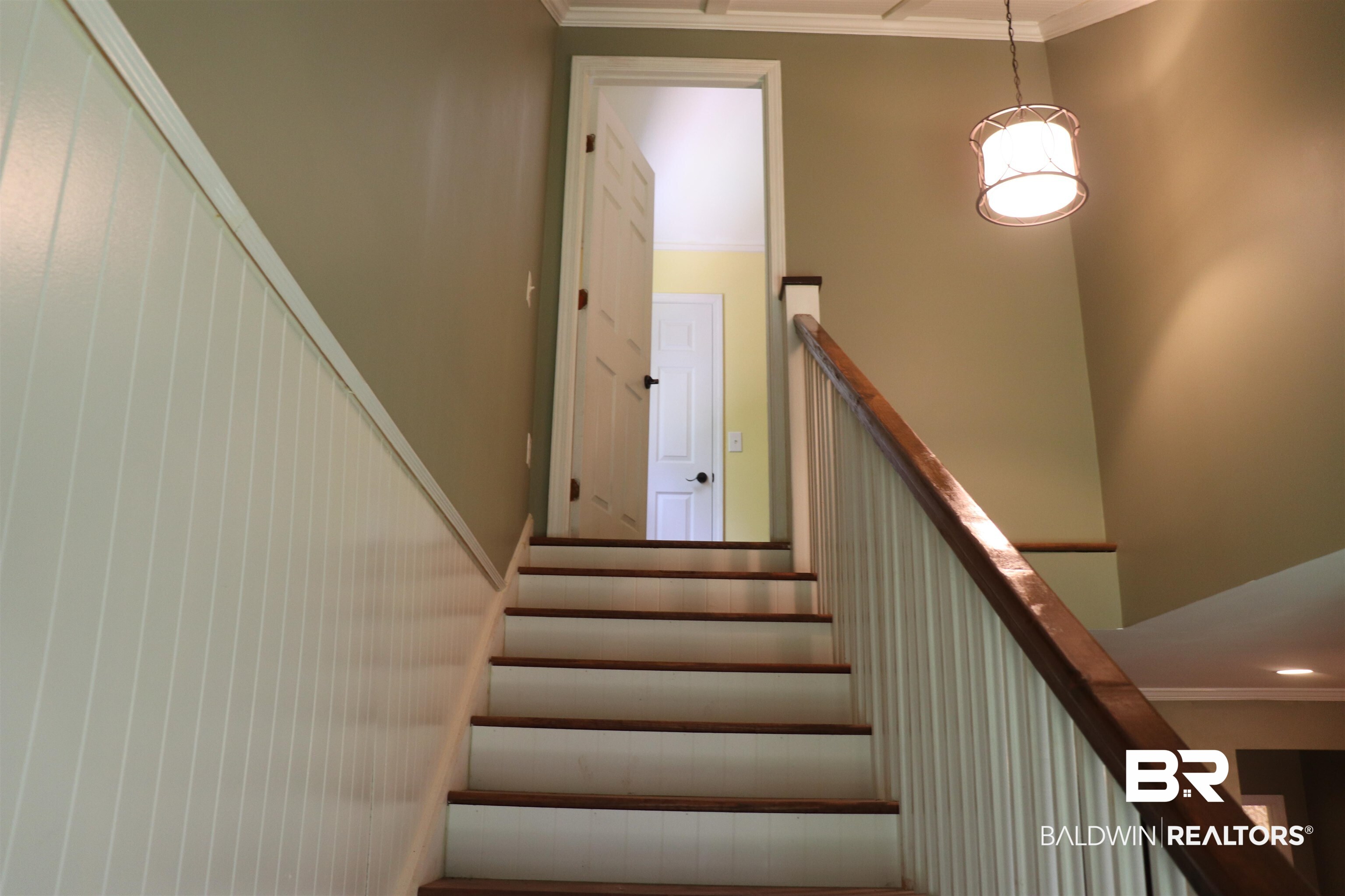 102 Brown Road Evergreen, AL 36401 - Photo 17 of 26 Stairs featuring crown molding