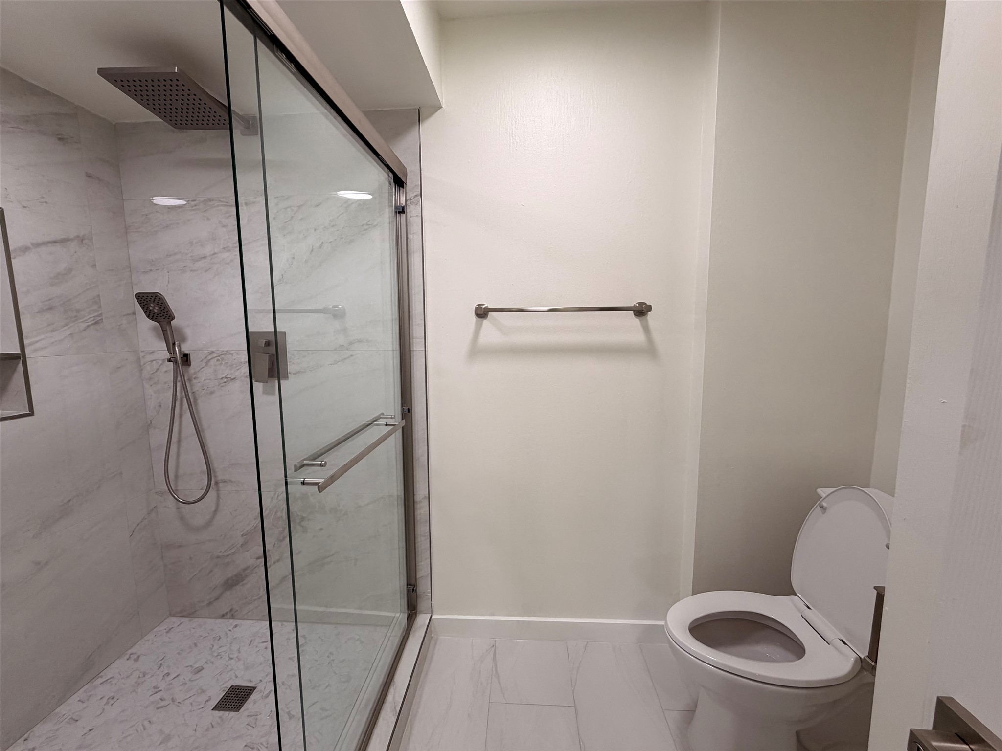 14682 Perthshire Road, Unit A Houston, TX 77079 - Photo 21 of 37 Primary walk-in shower.
