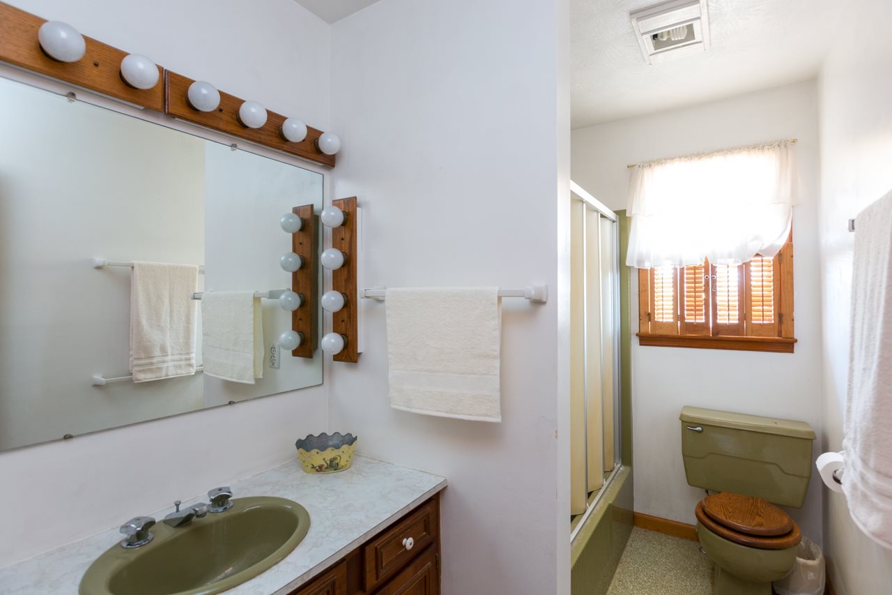 512 Curry Road Mount Solon, VA 22843 - Photo 9 of 26 a bathroom with a sink toilet and mirror