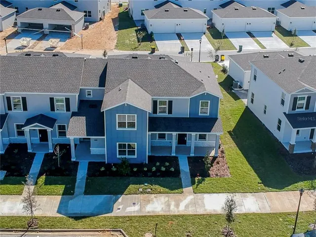 an aerial view of multiple houses