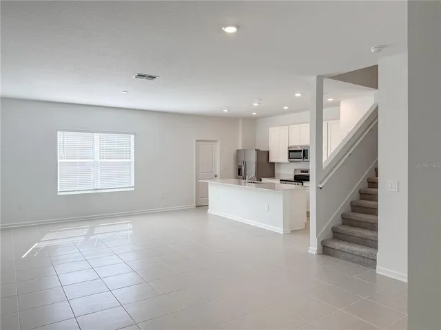 a view of kitchen with windows