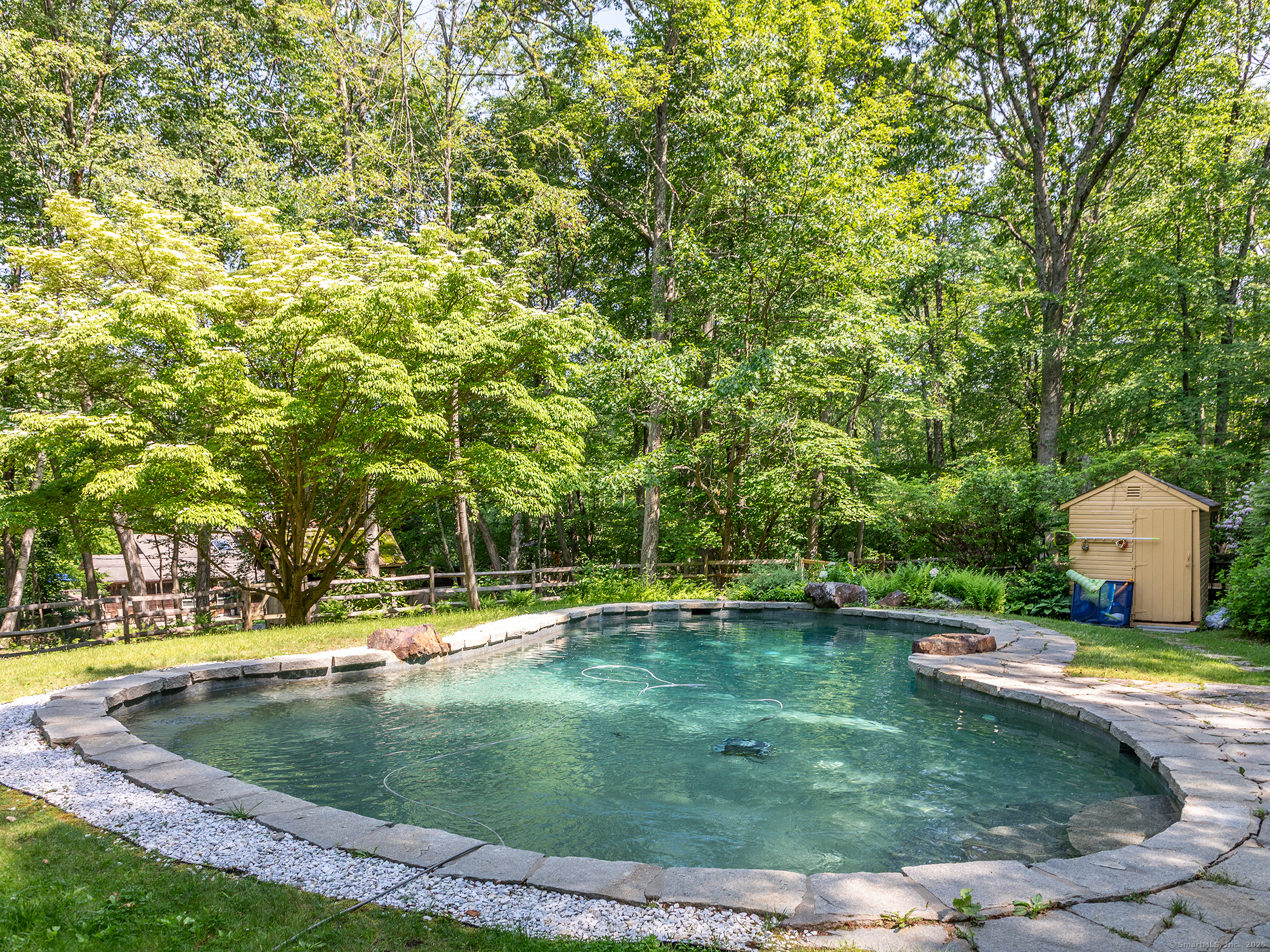 203 Brick School Road Warren, CT 06754 - Photo 12 of 40 a view of a swimming pool with a yard