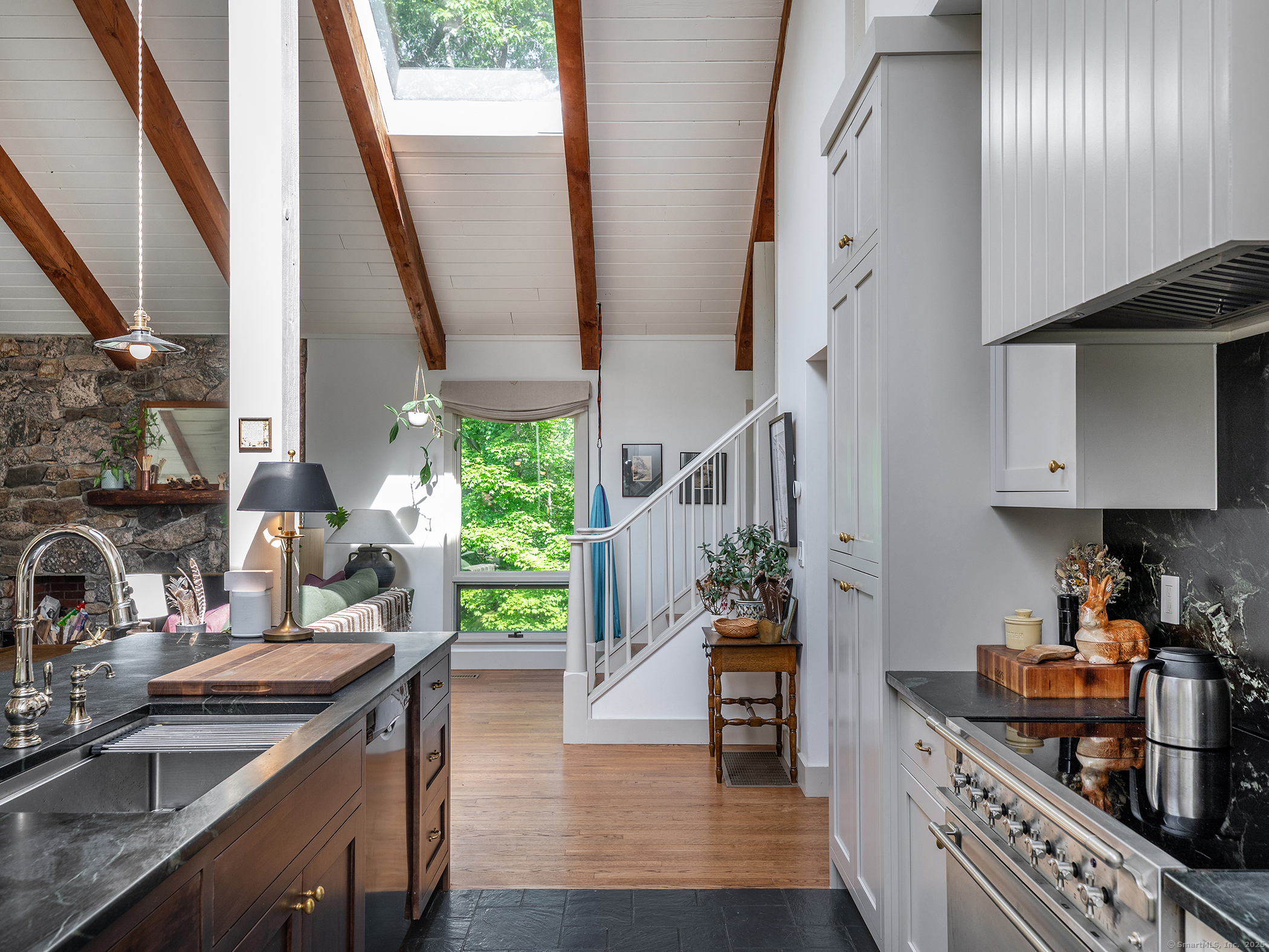 203 Brick School Road Warren, CT 06754 - Photo 23 of 40 a kitchen with stainless steel appliances granite countertop a stove a sink and a refrigerator