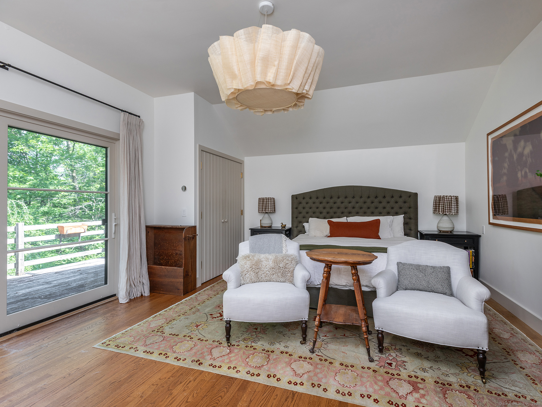 203 Brick School Road Warren, CT 06754 - Photo 27 of 40 a living room with furniture and a large window