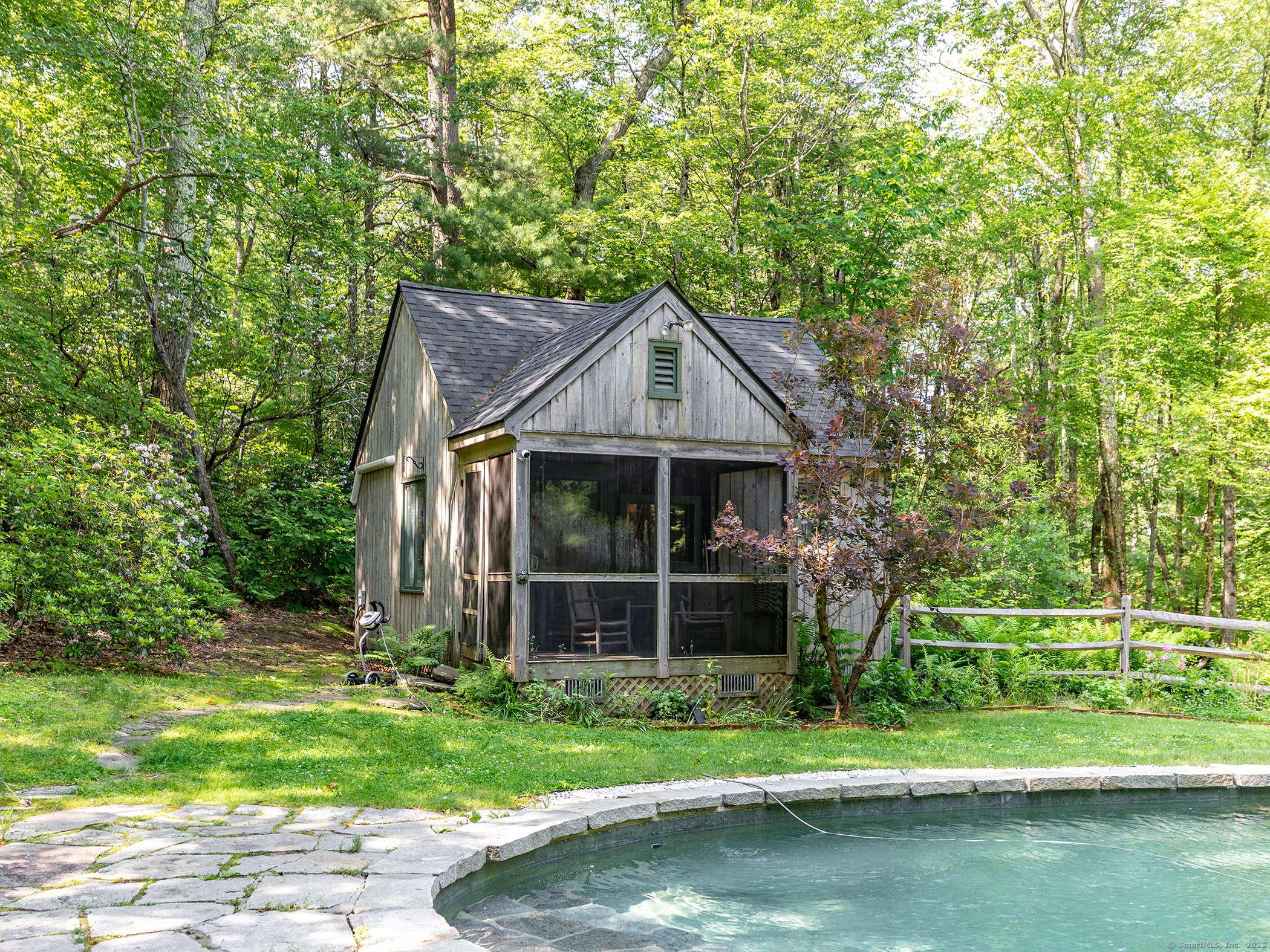 203 Brick School Road Warren, CT 06754 - Photo 34 of 40 a front view of a house with a yard