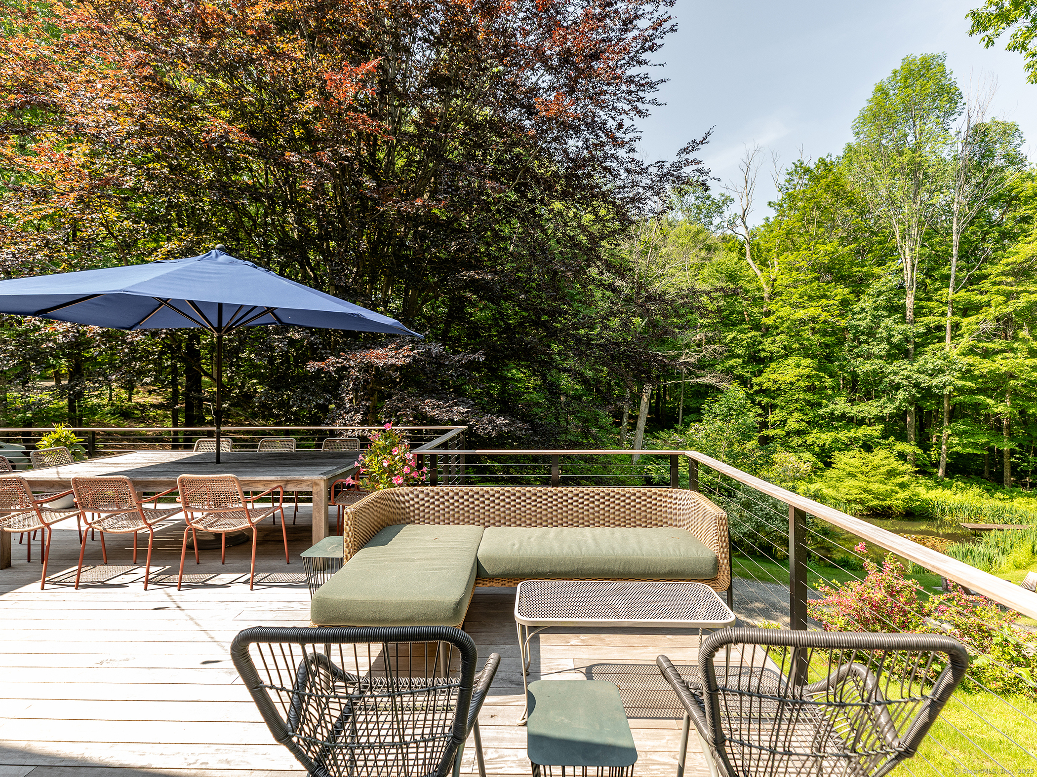 203 Brick School Road Warren, CT 06754 - Photo 4 of 40 a view of a chairs and tables in the balcony