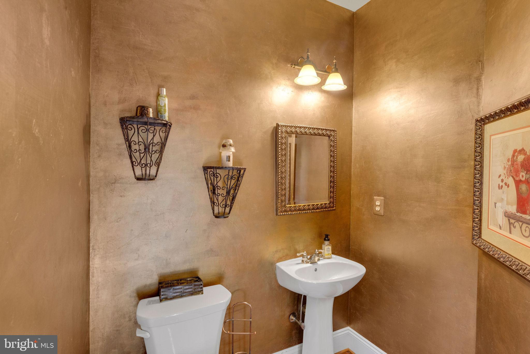 115 Muirfield Lane Chalfont, PA 18914 - Photo 12 of 59 a bathroom with a sink and a mirror
