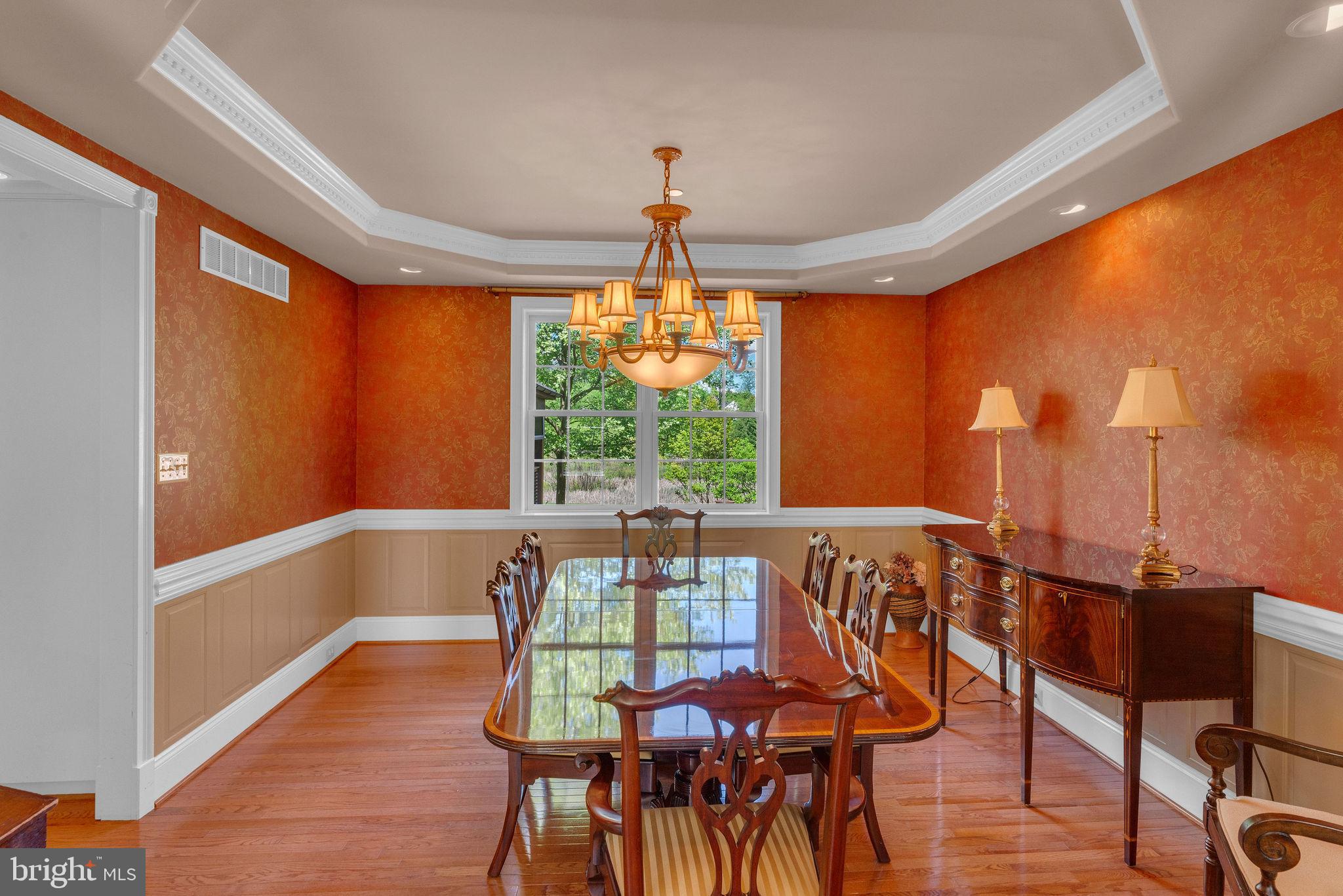 115 Muirfield Lane Chalfont, PA 18914 - Photo 15 of 59 a view of a dining room with furniture window and wooden floor