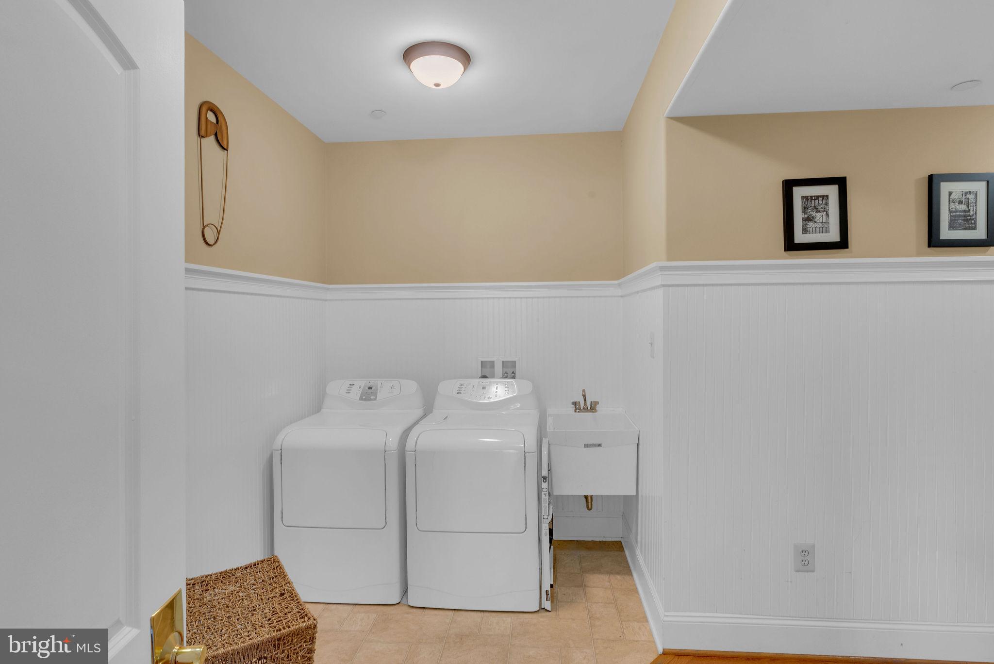 115 Muirfield Lane Chalfont, PA 18914 - Photo 22 of 59 a utility room with dryer and washer