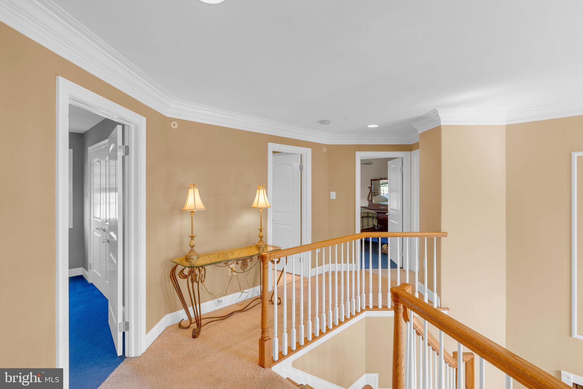 115 Muirfield Lane Chalfont, PA 18914 - Photo 28 of 59 a view of a hallway with windows and stairs