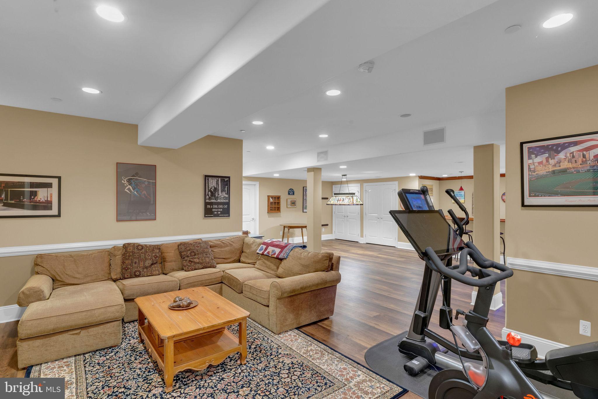 115 Muirfield Lane Chalfont, PA 18914 - Photo 37 of 59 a living room with furniture and a couch