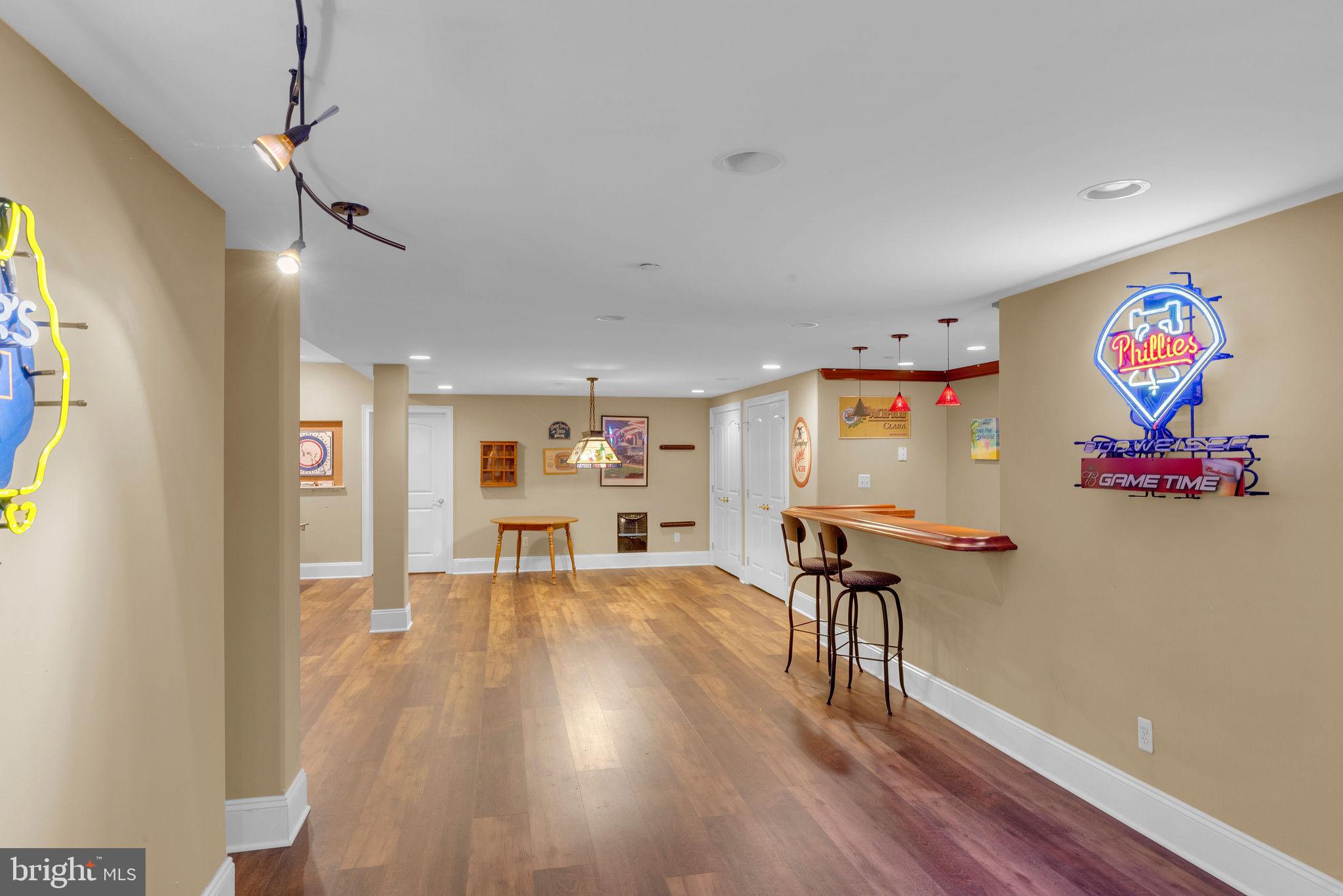 115 Muirfield Lane Chalfont, PA 18914 - Photo 38 of 59 a view of a livingroom with furniture wooden floor and a rug
