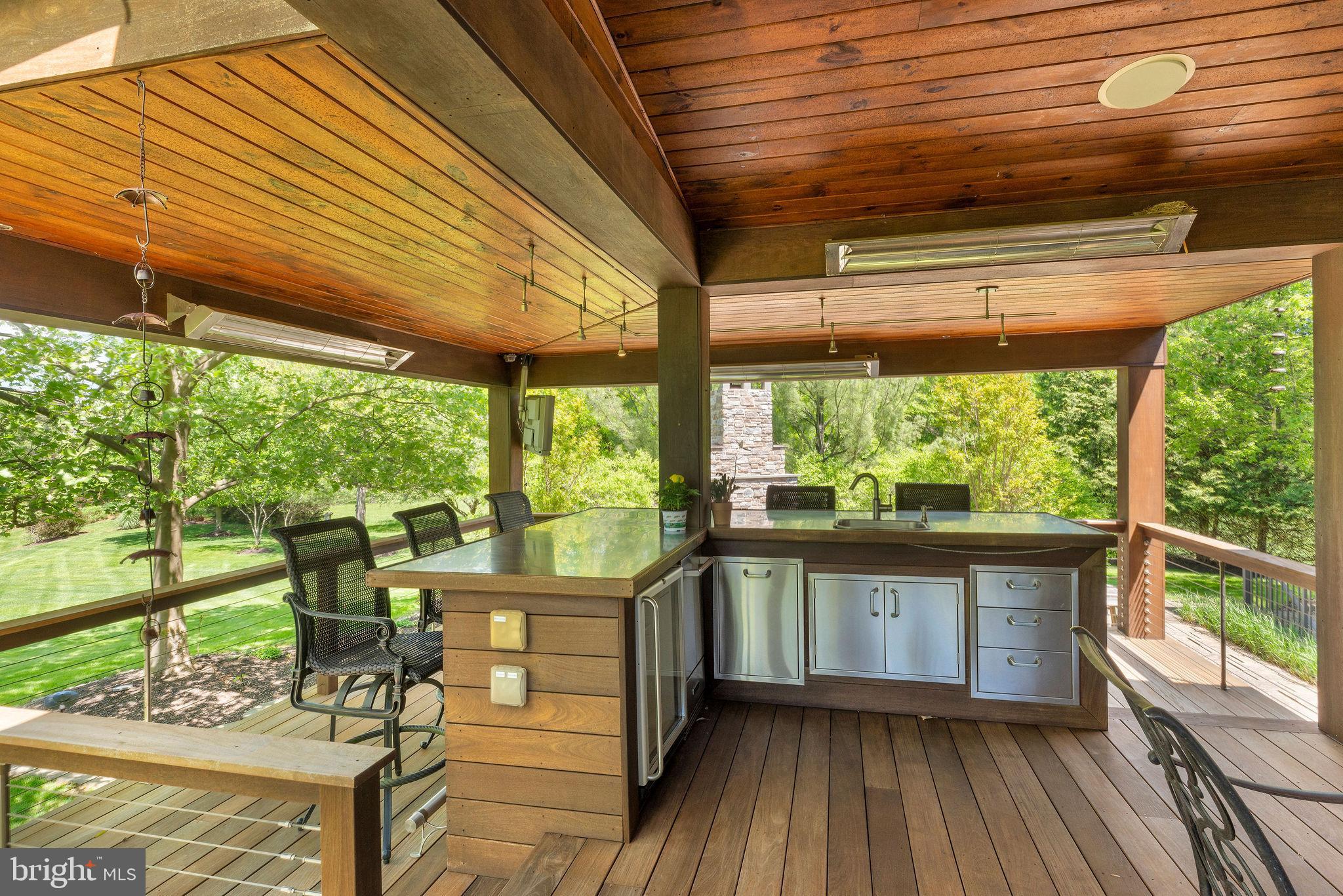 115 Muirfield Lane Chalfont, PA 18914 - Photo 44 of 59 a view of a porch with furniture and wooden floor