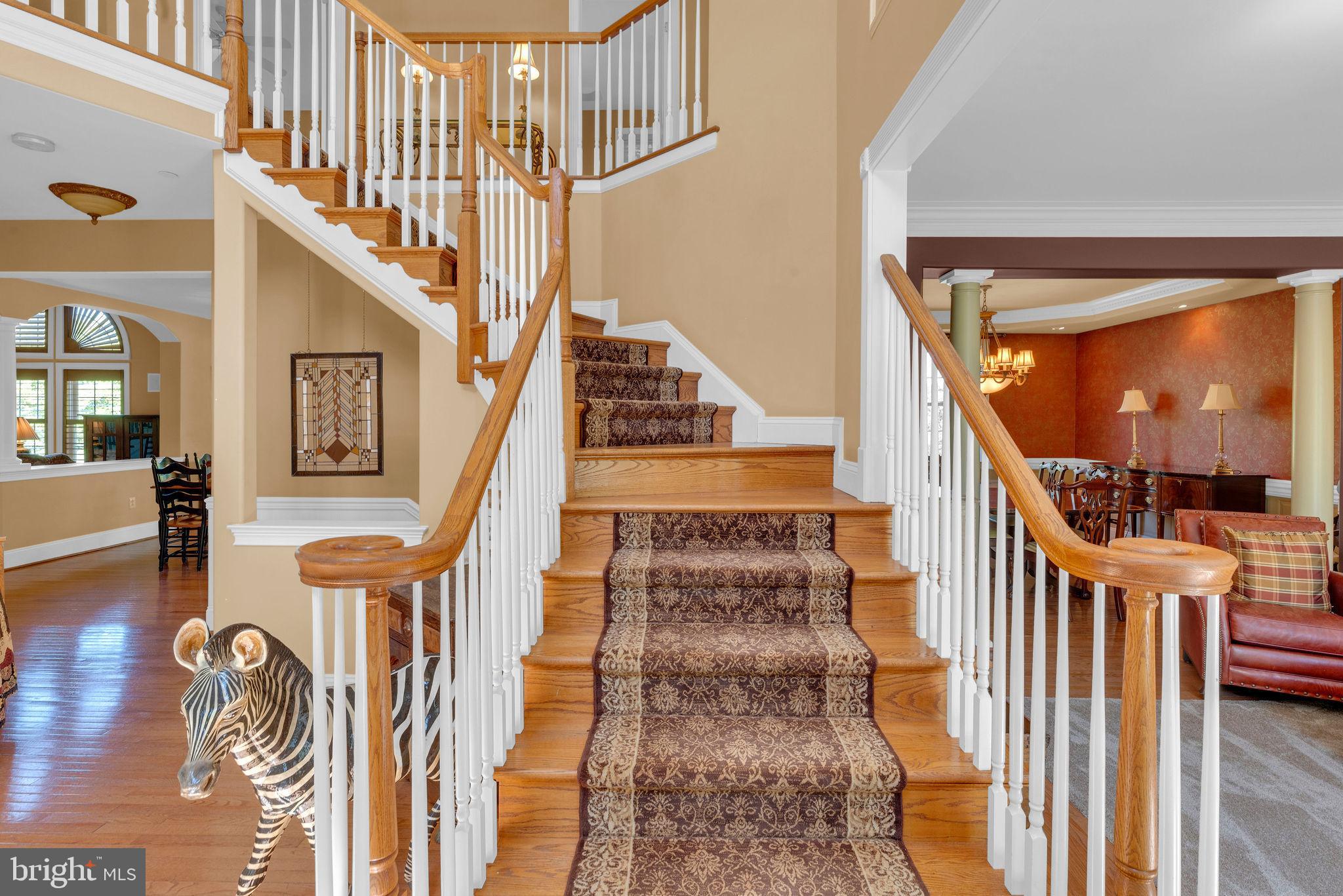 115 Muirfield Lane Chalfont, PA 18914 - Photo 7 of 59 a view of an entryway with wooden floor and windows