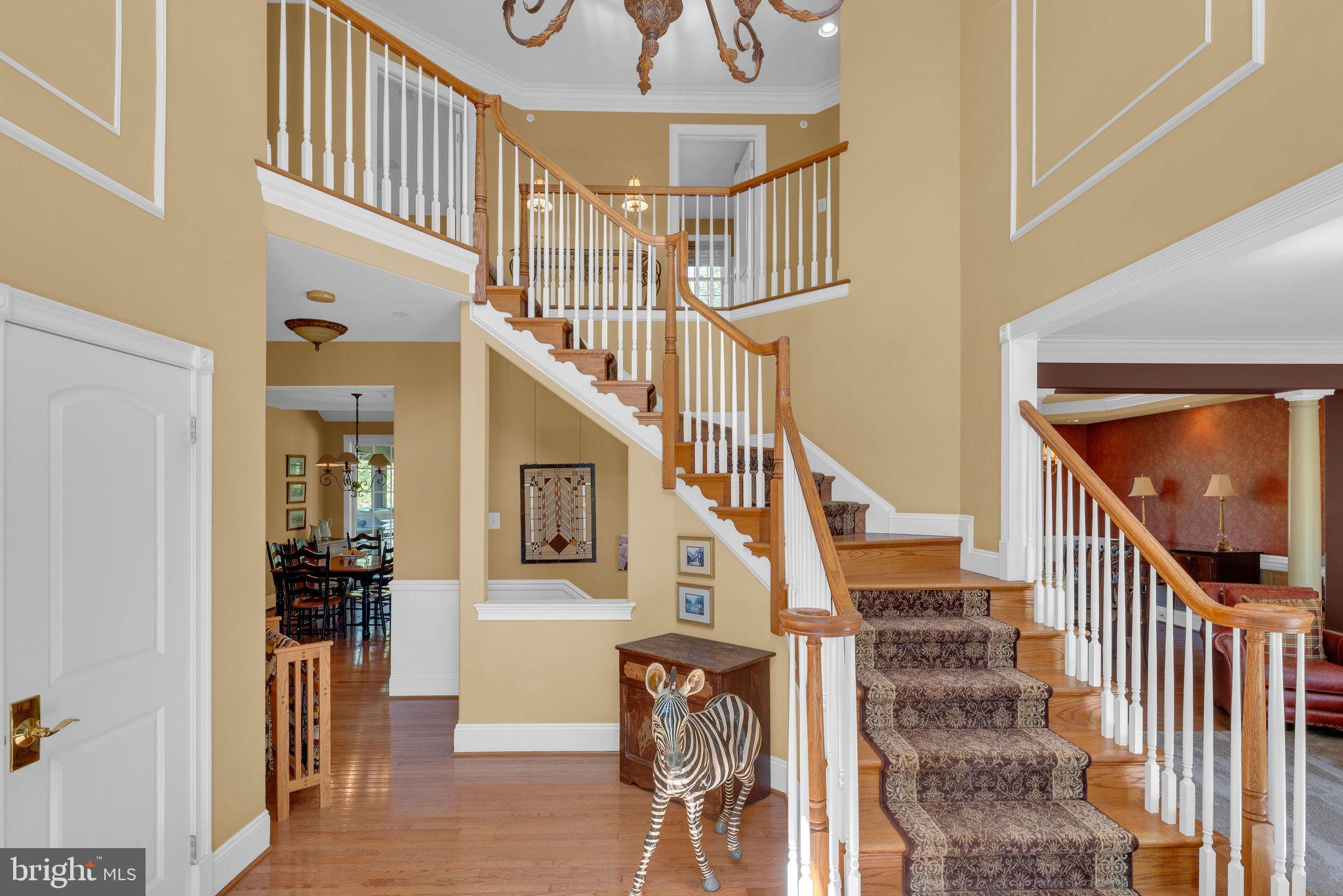 115 Muirfield Lane Chalfont, PA 18914 - Photo 8 of 59 a view of entryway and hall with wooden floor