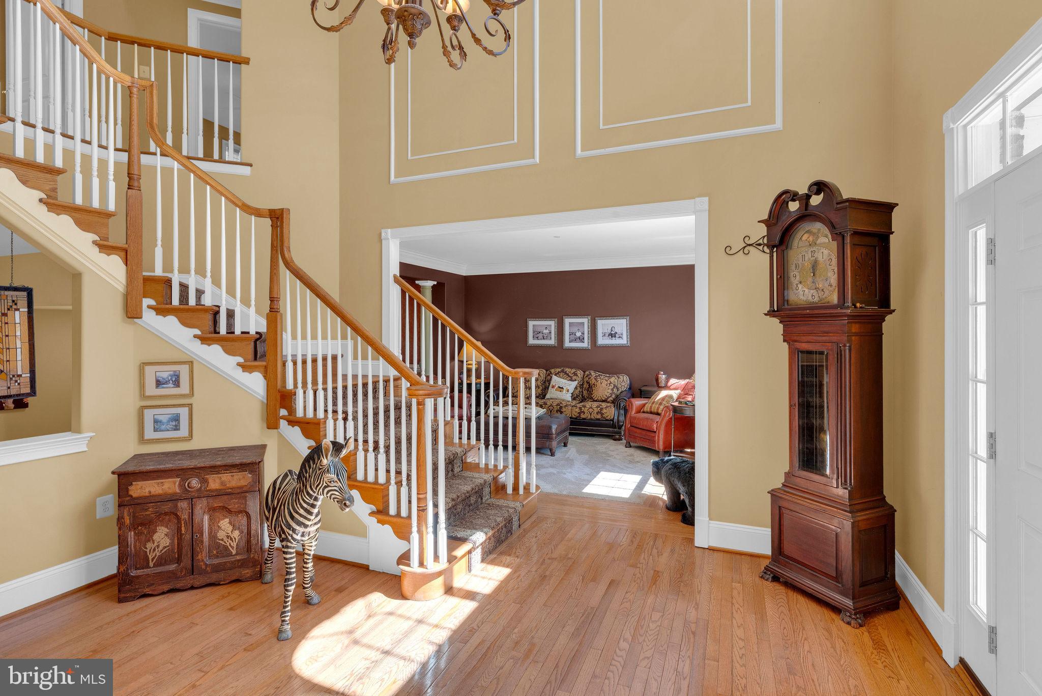 115 Muirfield Lane Chalfont, PA 18914 - Photo 9 of 59 a view of entryway livingroom and hall with wooden floor