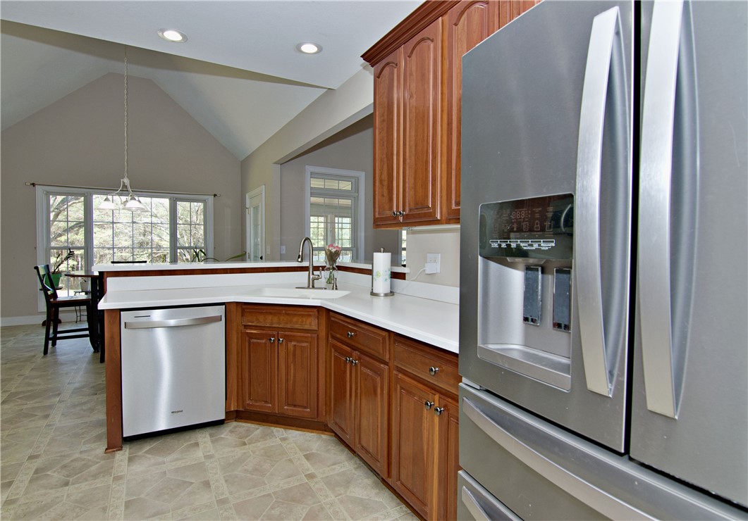 7893 Athens Road Carnesville, GA 30521 - Photo 15 of 50 This bright kitchen features modern appliances and ample counter space for culinary pursuits.