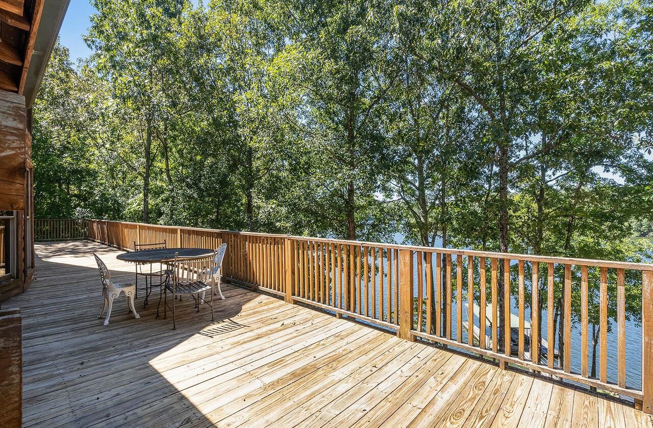 2221 County Road 6 Wedowee, AL 36278 - Photo 9 of 40 a balcony with wooden floor and outdoor space