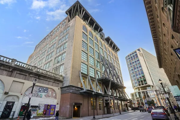 a view of a building with a street