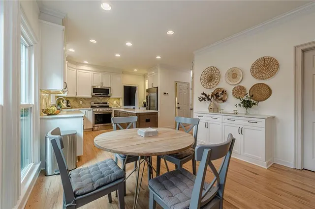a view of a dining room with furniture