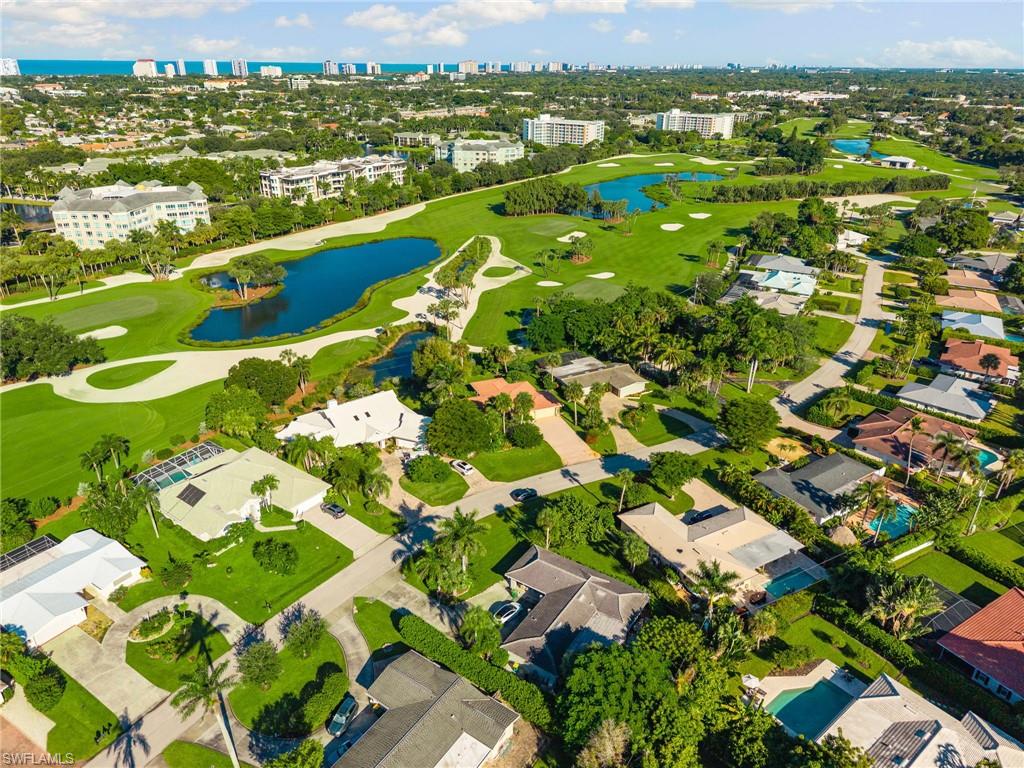 77 Cypress Point Drive Naples, FL 34105 - Photo 12 of 23 a view of a city