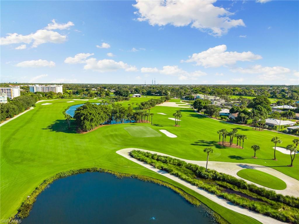 77 Cypress Point Drive Naples, FL 34105 - Photo 14 of 23 a view of a city