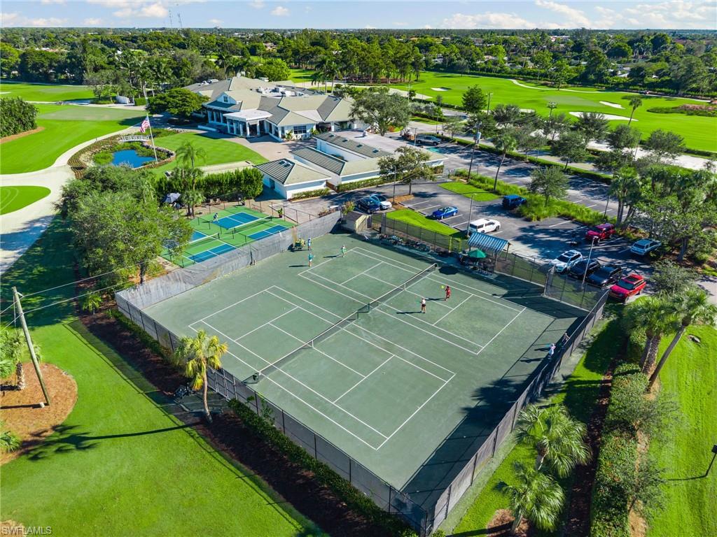 77 Cypress Point Drive Naples, FL 34105 - Photo 16 of 23 an aerial view of a tennis ground and tennis court