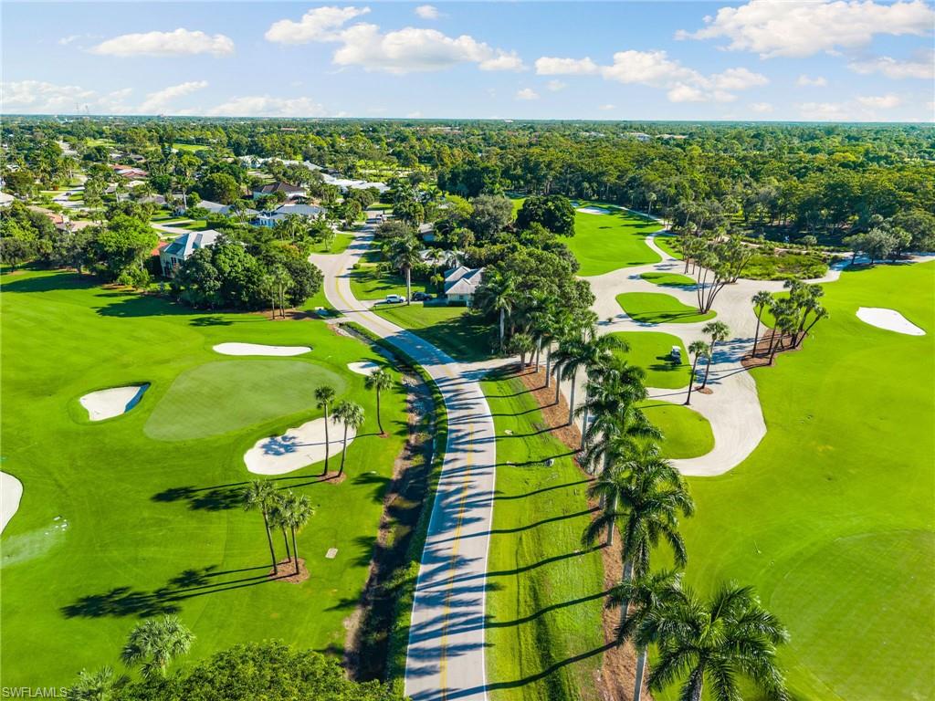 77 Cypress Point Drive Naples, FL 34105 - Photo 19 of 23 a view of a bunch of flowers in it