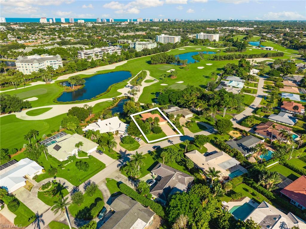 77 Cypress Point Drive Naples, FL 34105 - Photo 4 of 23 a view of a city