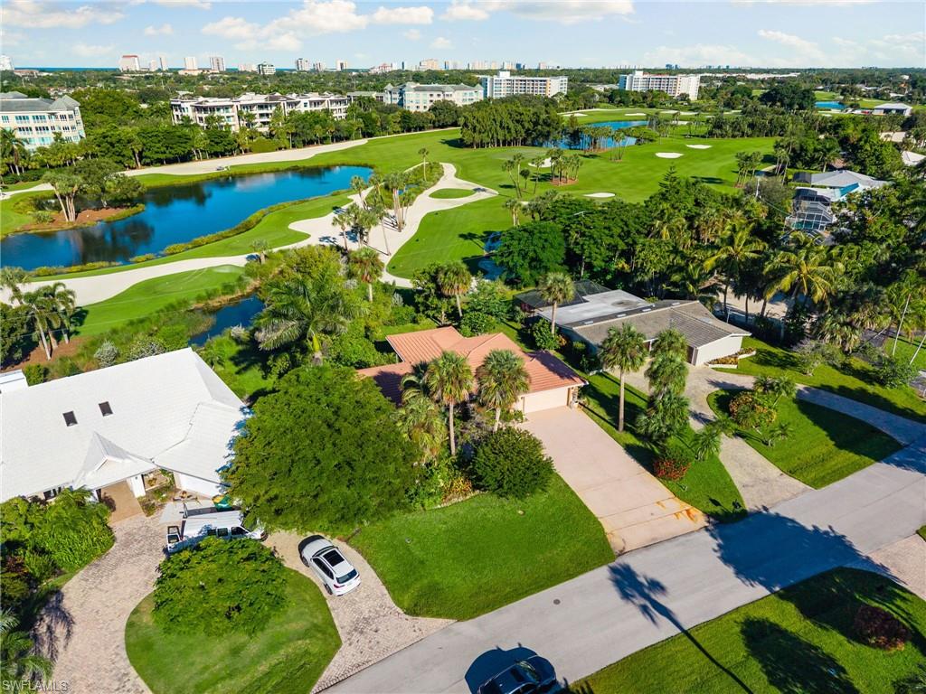 77 Cypress Point Drive Naples, FL 34105 - Photo 6 of 23 an aerial view of a house with a garden