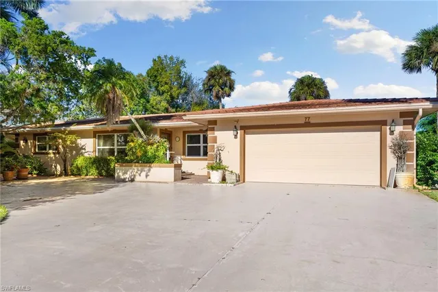 a view of a house with a outdoor space and porch