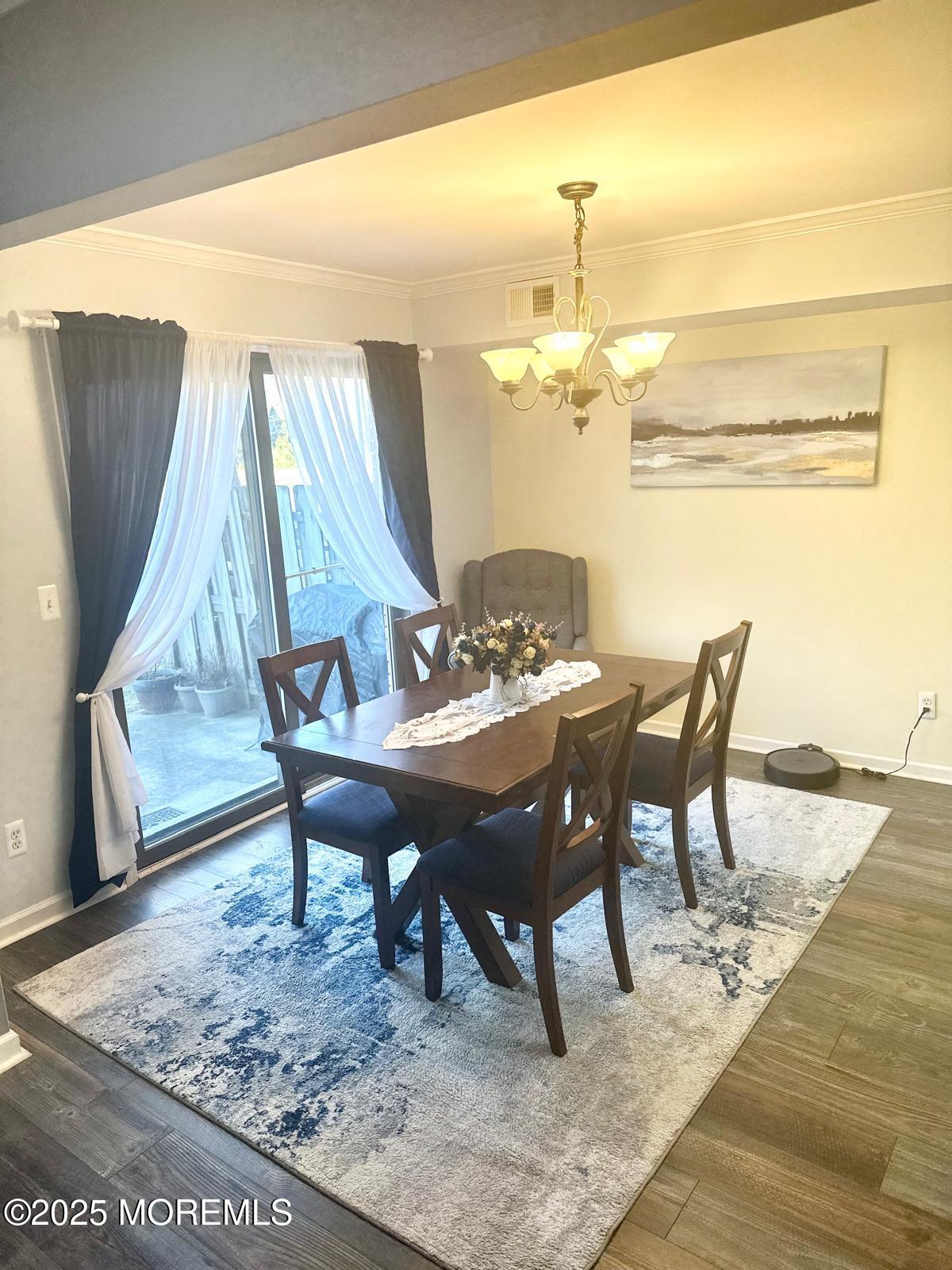 49 White Swan Way Brick, NJ 08723 - Photo 16 of 30 a dining room with furniture and window