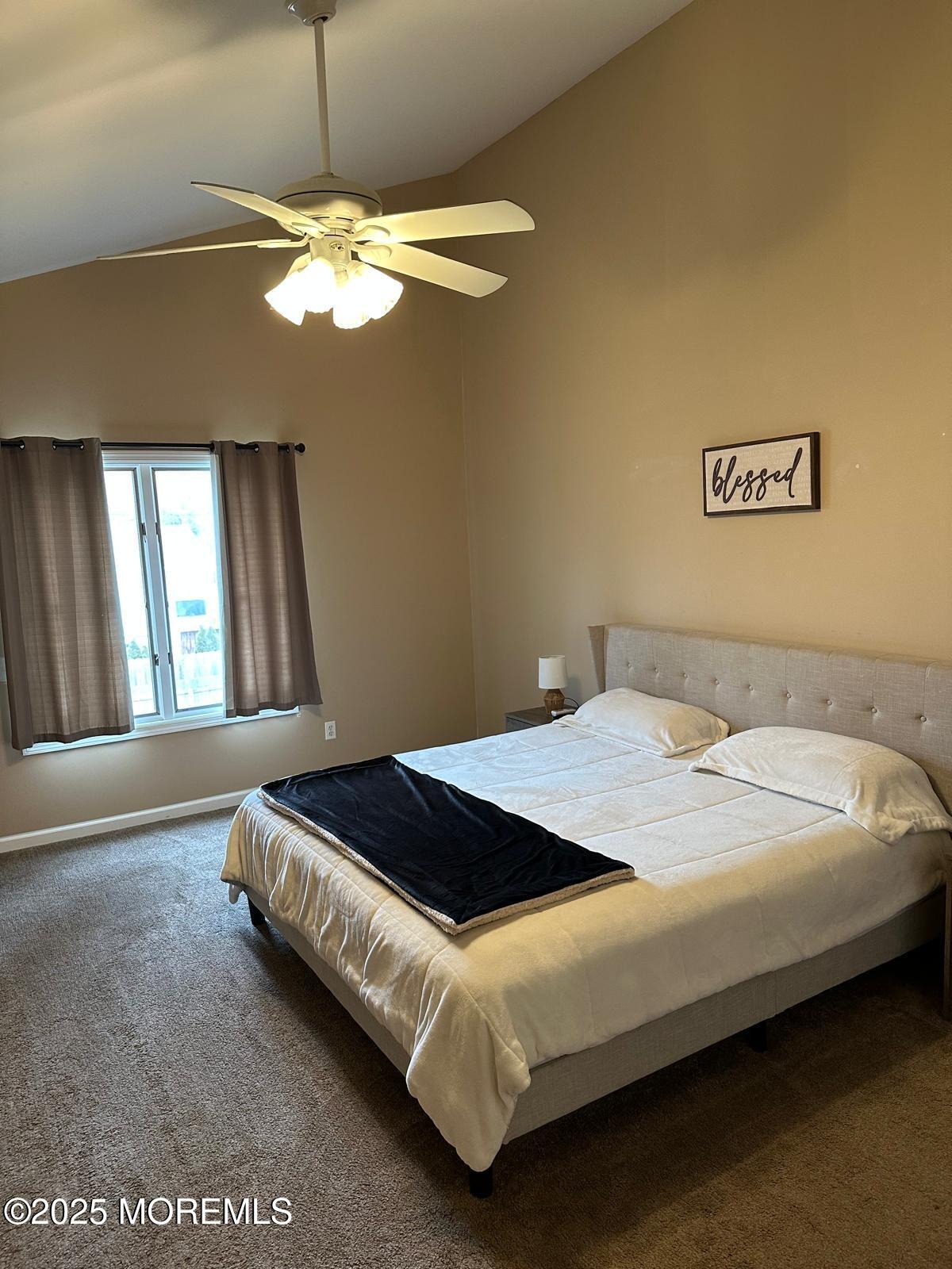 49 White Swan Way Brick, NJ 08723 - Photo 25 of 30 a bedroom with a bed and window