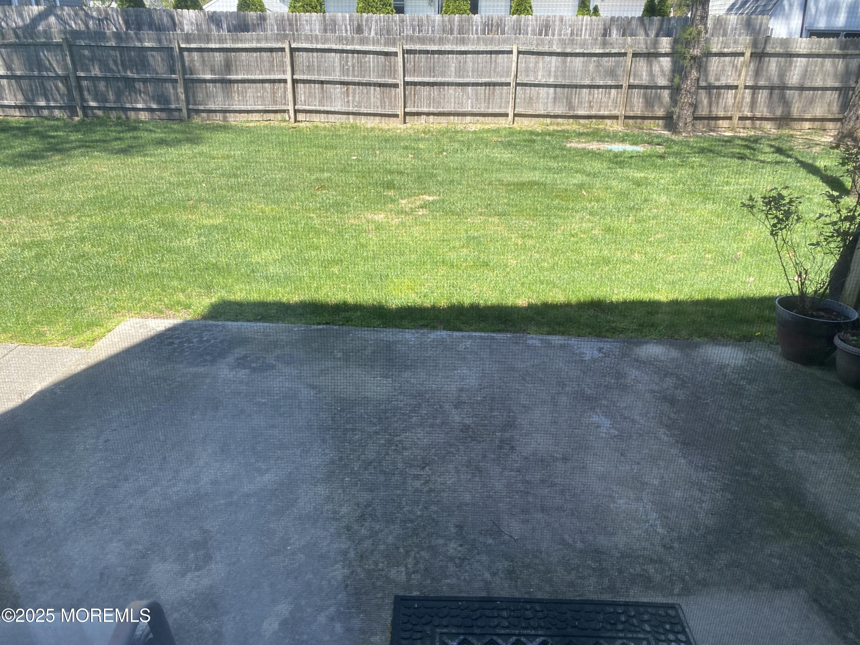 49 White Swan Way Brick, NJ 08723 - Photo 4 of 30 a view of a backyard