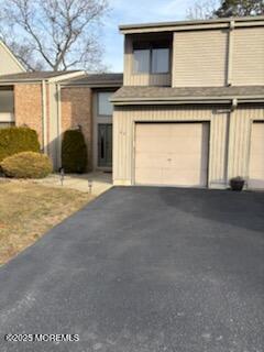 49 White Swan Way Brick, NJ 08723 - Photo 5 of 30 a view of a house with a street