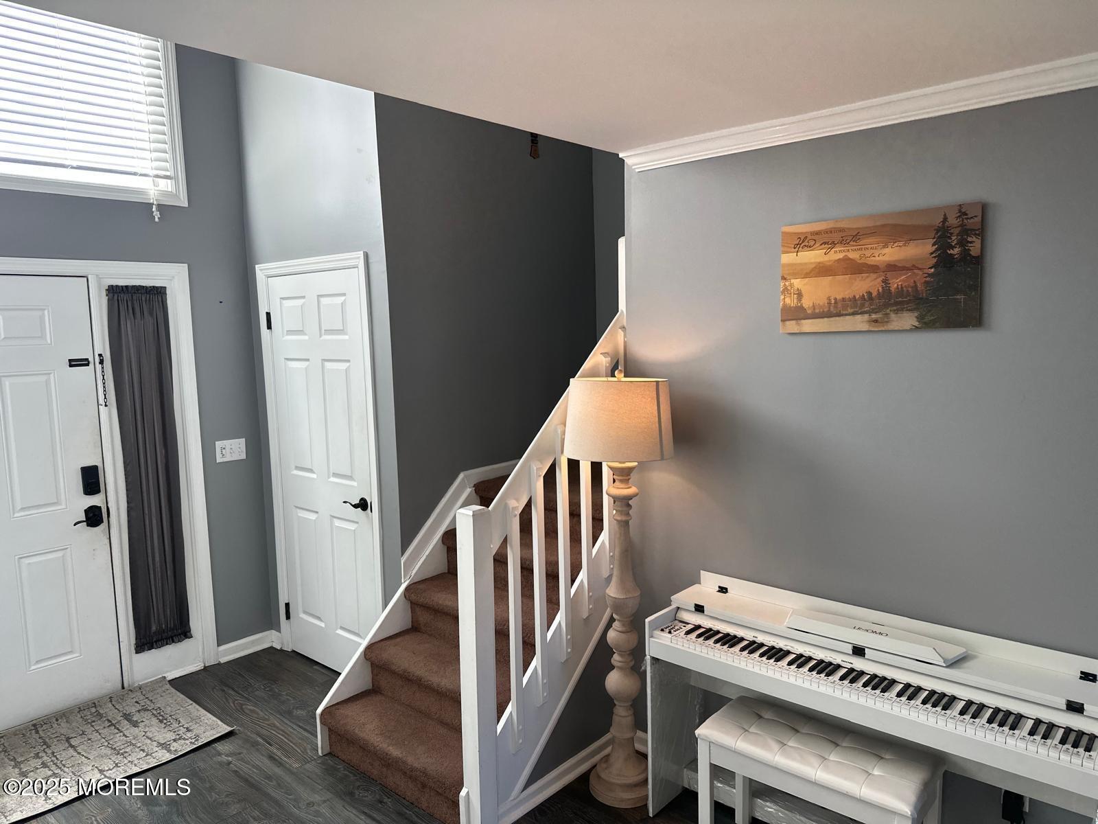 49 White Swan Way Brick, NJ 08723 - Photo 7 of 30 a view of an entryway with workspace