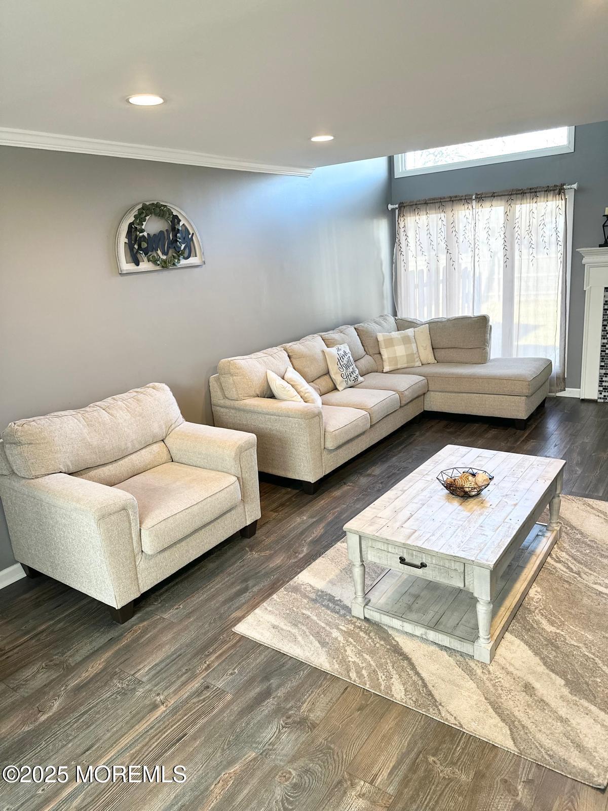 49 White Swan Way Brick, NJ 08723 - Photo 9 of 30 a living room with furniture and a window