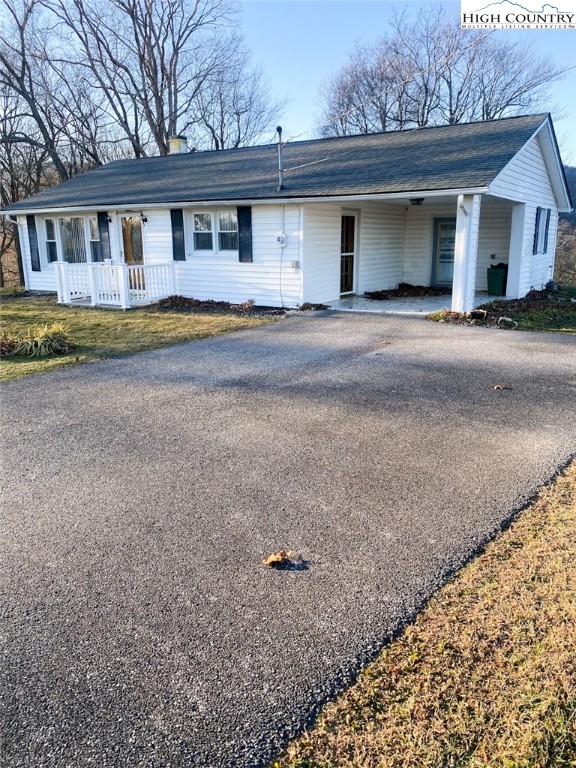 7874 Flat Ridge Road Troutdale, VA 24378 - Photo 2 of 37 a house view with a backyard space