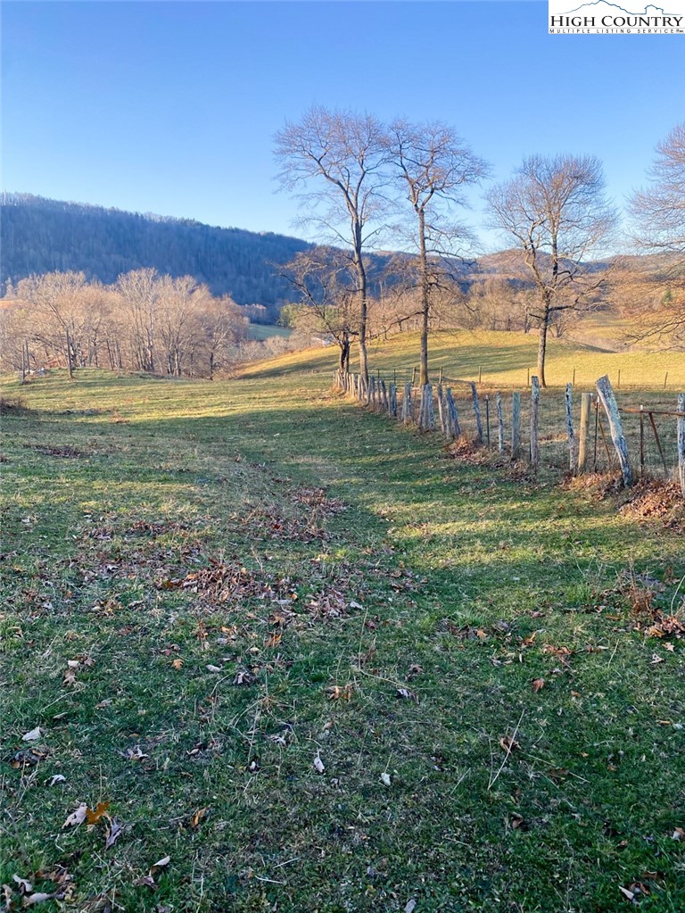 7874 Flat Ridge Road Troutdale, VA 24378 - Photo 33 of 37 a view of a yard with an outdoor seating