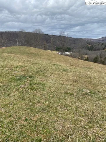 a view of a swimming pool and a mountain