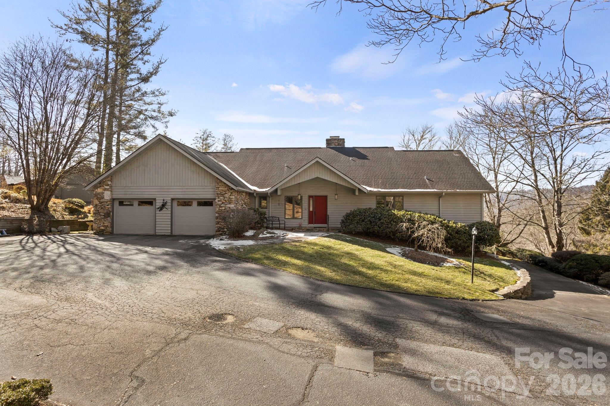 404 Browning Road Hendersonville, NC 28791 - Photo 1 of 46 a view of house with a yard