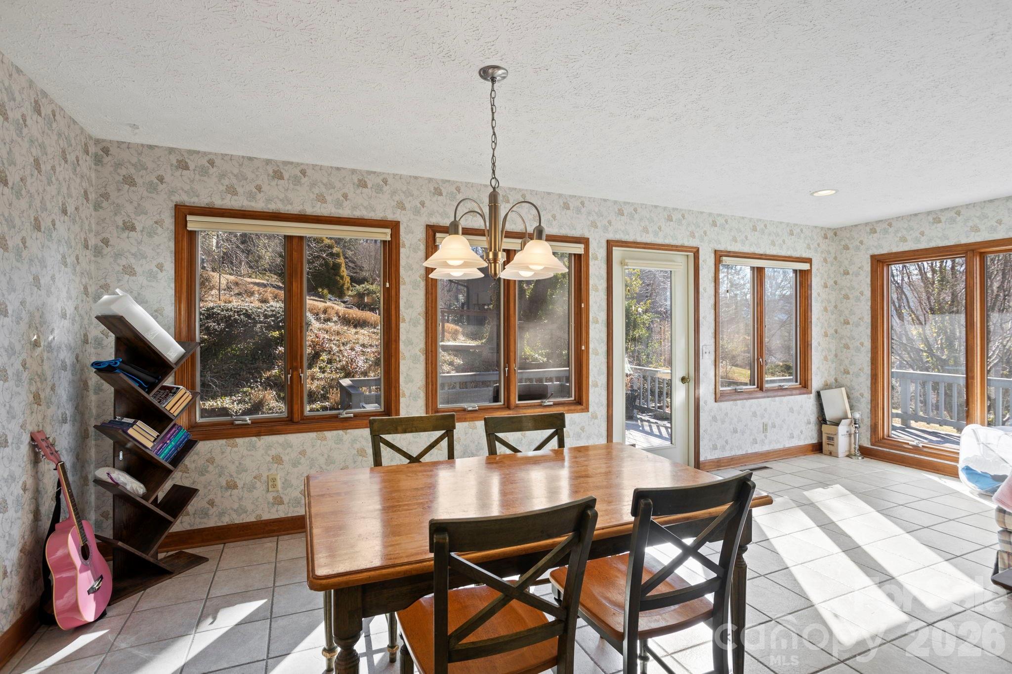 404 Browning Road Hendersonville, NC 28791 - Photo 15 of 46 a dining room with furniture and window